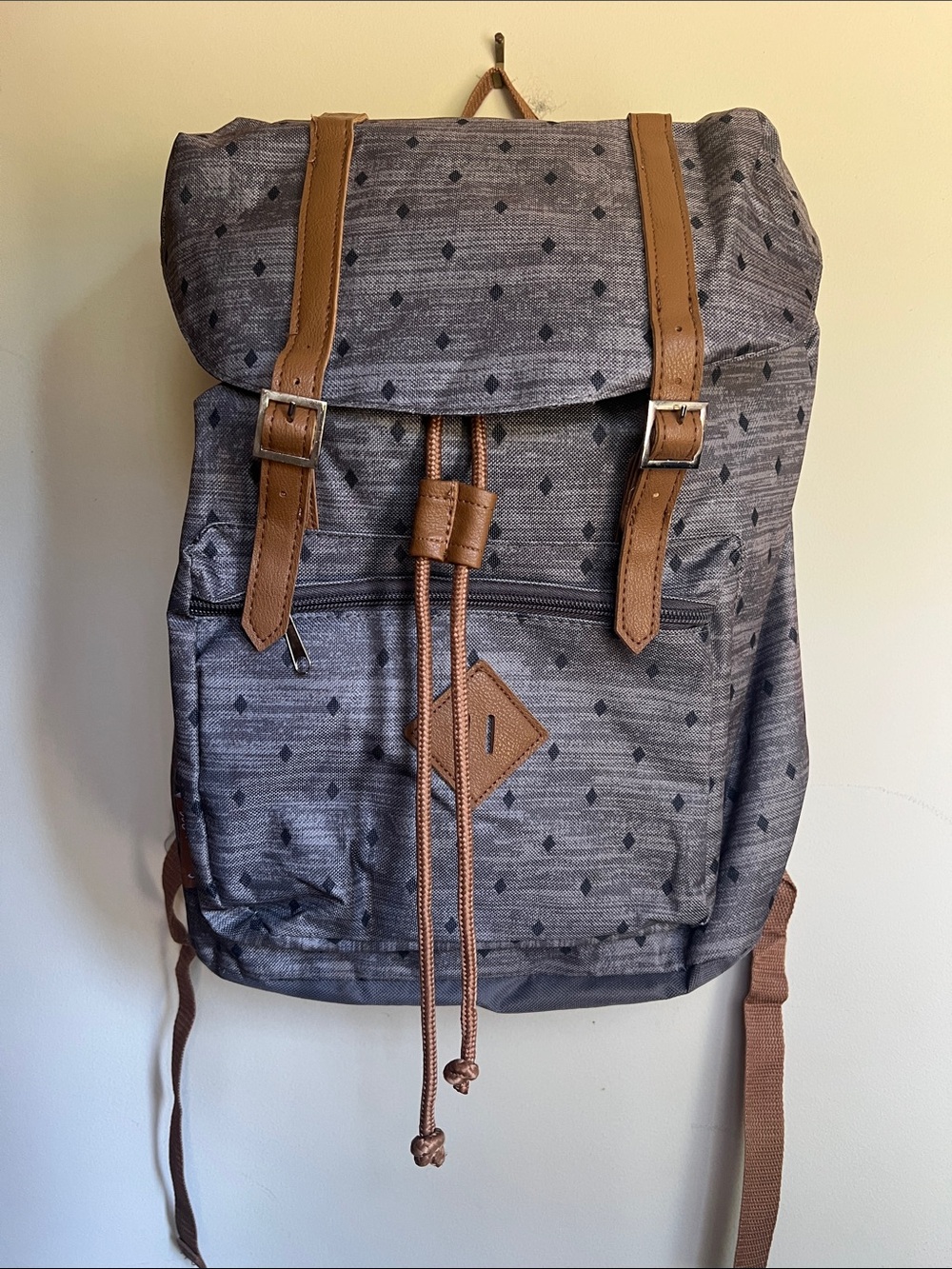 Gray Patterned Backpack with Tan Accents